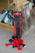 A black and red Golf bag including 12 clubs.