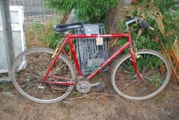 A gent's 21 speed Raleigh bicycle.