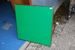 A green top card table.