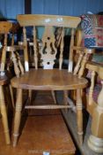 Two carver kitchen chairs.