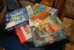 A box of mixed games including monopoly, telly addicts, blockbusters etc.