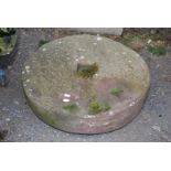 A cider Mill Stone, 39" diameter x 9" deep.