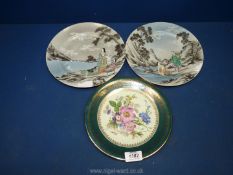 Three wall plates, two oriental and one Limoges with flowers (one hand painted).