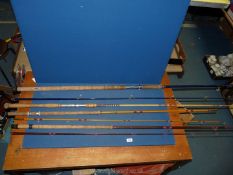 A quantity of fishing rods including Paragon 60-1 fishing rod, 7' fibreglass rod,