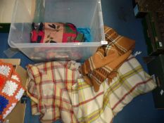 A quantity of blankets including three travel rugs and three large wool blankets.