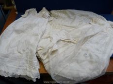 A small quantity of children's night dresses and Christening gowns to include; netted, silk Habotai,