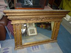 A large gilt, bevelled edge overmantle mirror,