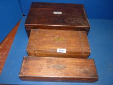 Three wooden boxes including the largest in Mahogany with Mother of Pearl inlay, a/f,