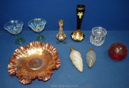 A box of glass including a wavy edged carnival glass dish, posy vases, glass paperweight, etc.