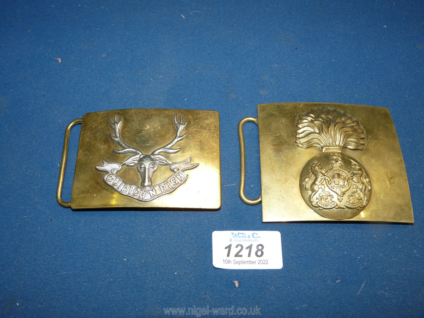 Two military belt plates; The Royal Scots Fusileers and The Seaforth Highlanders.