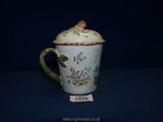 A French Faience Sceaux covered chocolate Cup, possibly 18th c. manufacturers mark to base.