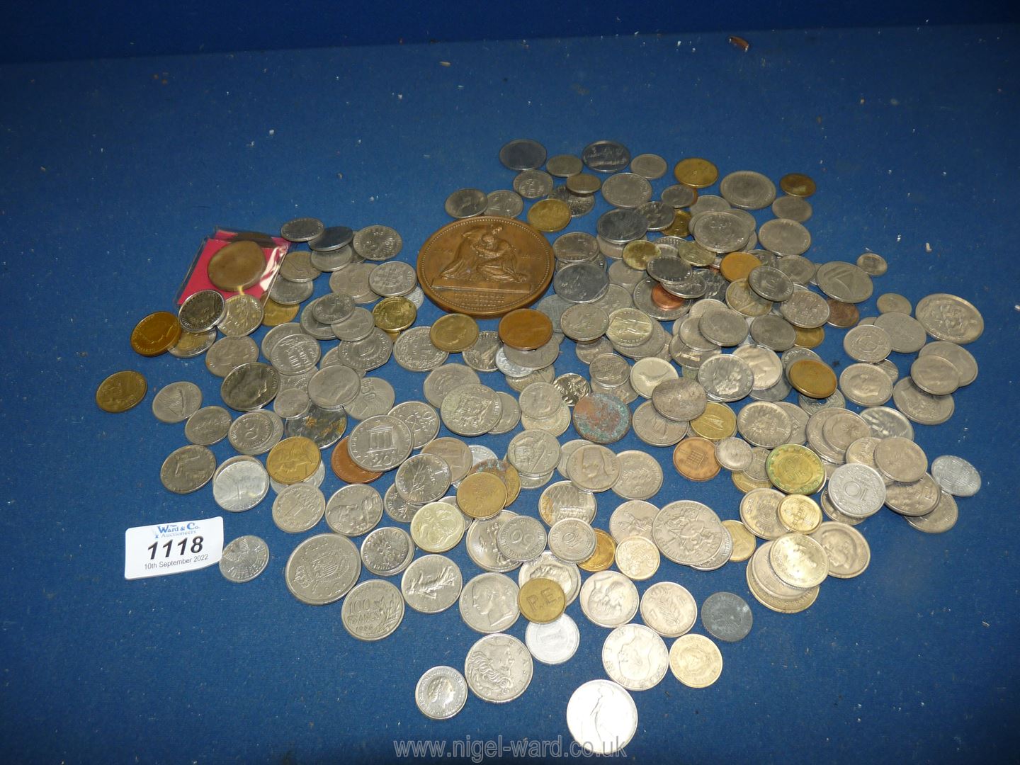 A quantity of coins; mostly foreign, plus a bronze medal/plaque. - Image 2 of 2