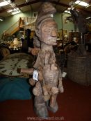 A Tribal Art Yaka fetish figure decorated with bones, horns, bamboo and fetish bundles,