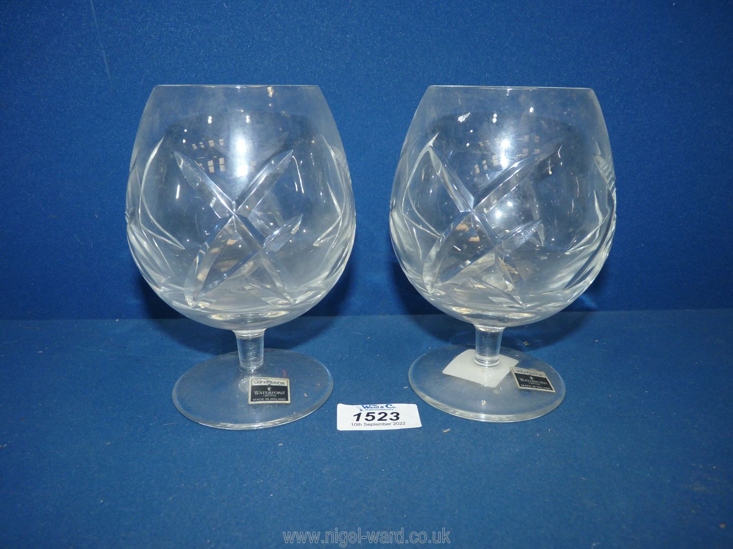 Two 'John Rocha' Waterford crystal brandy balloons.