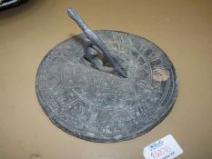 A very heavy sundial, most unusually of lead construction, the hours marked with Roman numerals,