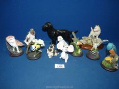 A small quantity of animal ornaments to include; Sherrat & Simpson Westie, birds, black Labrador,