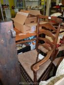 A late 19th c. Oak and rush Lancashire Armchair with ladder back bobbin turned detail.