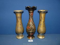 A pair of Toleware baluster Vases with silver coloured decoration (10" tall),