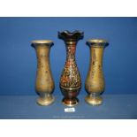 A pair of Toleware baluster Vases with silver coloured decoration (10" tall),