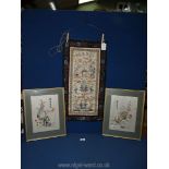 A pair of Oriental silk on silk embroideries of Prunus and Peacocks, signed in needlework,