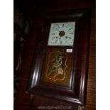 An American 'Ogive' wall clock with bird motif to the glass, the movement striking on a gong.