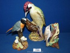 A large Beswick woodpecker 8½" tall badly damaged- some parts repaired,