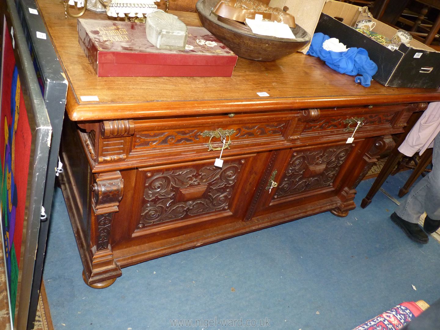 An extremely heavy rich gold Oak Sideboard/serving Table having a pair of frieze drawers with blind