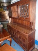 An Eastern hardwood framed enclosed Dresser,