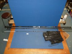 A 15' X-Symmetry surf 450 beachcaster carbon fibre fishing rod, 3 sections with rubber handle,