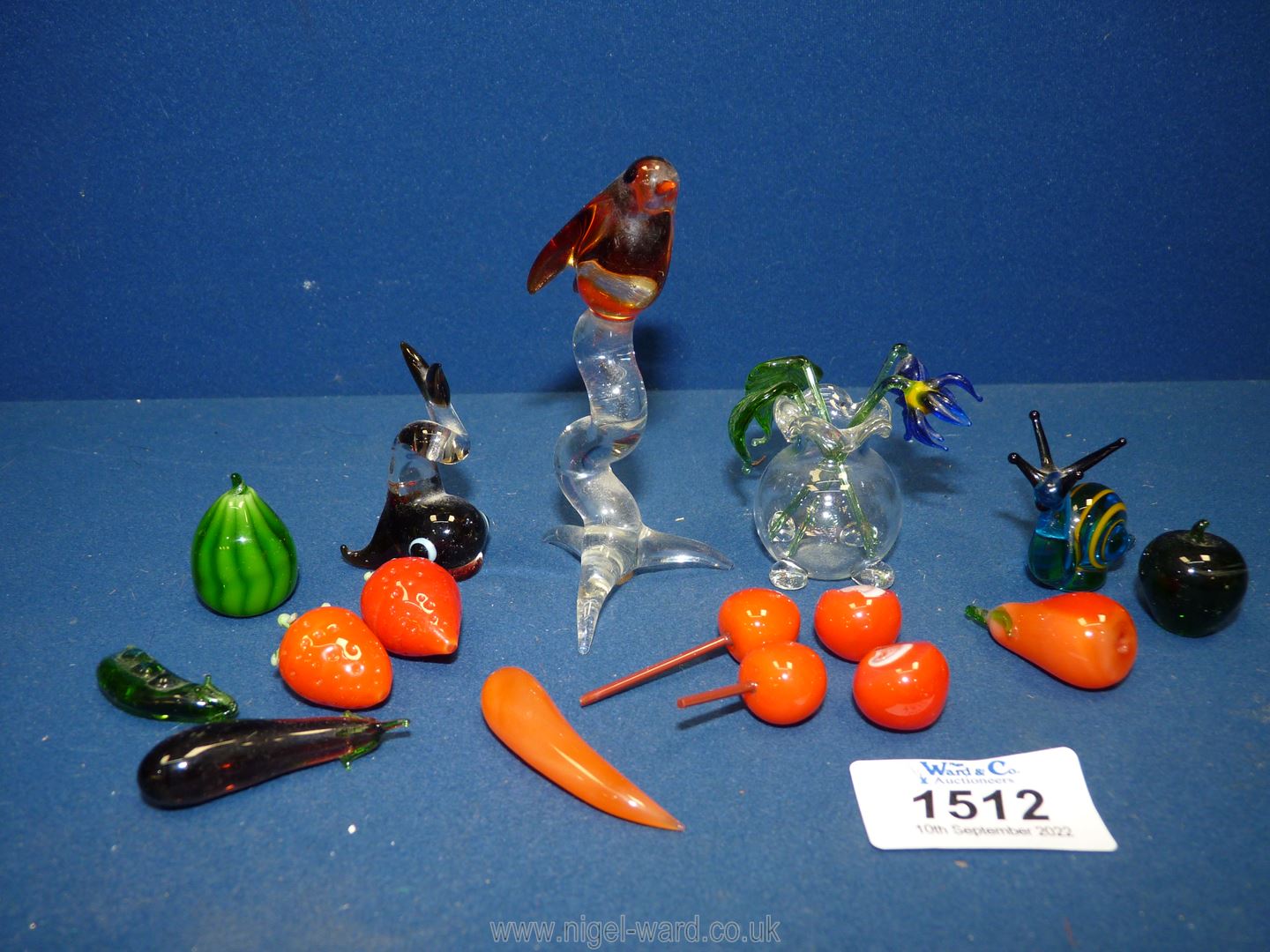 A small quantity of glass items to include fruit, vegetables, snail, robin, etc.