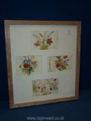 Four vintage floral wallpaper designs in a single limed oak frame, 16 1/2'' x 18 1/2''.