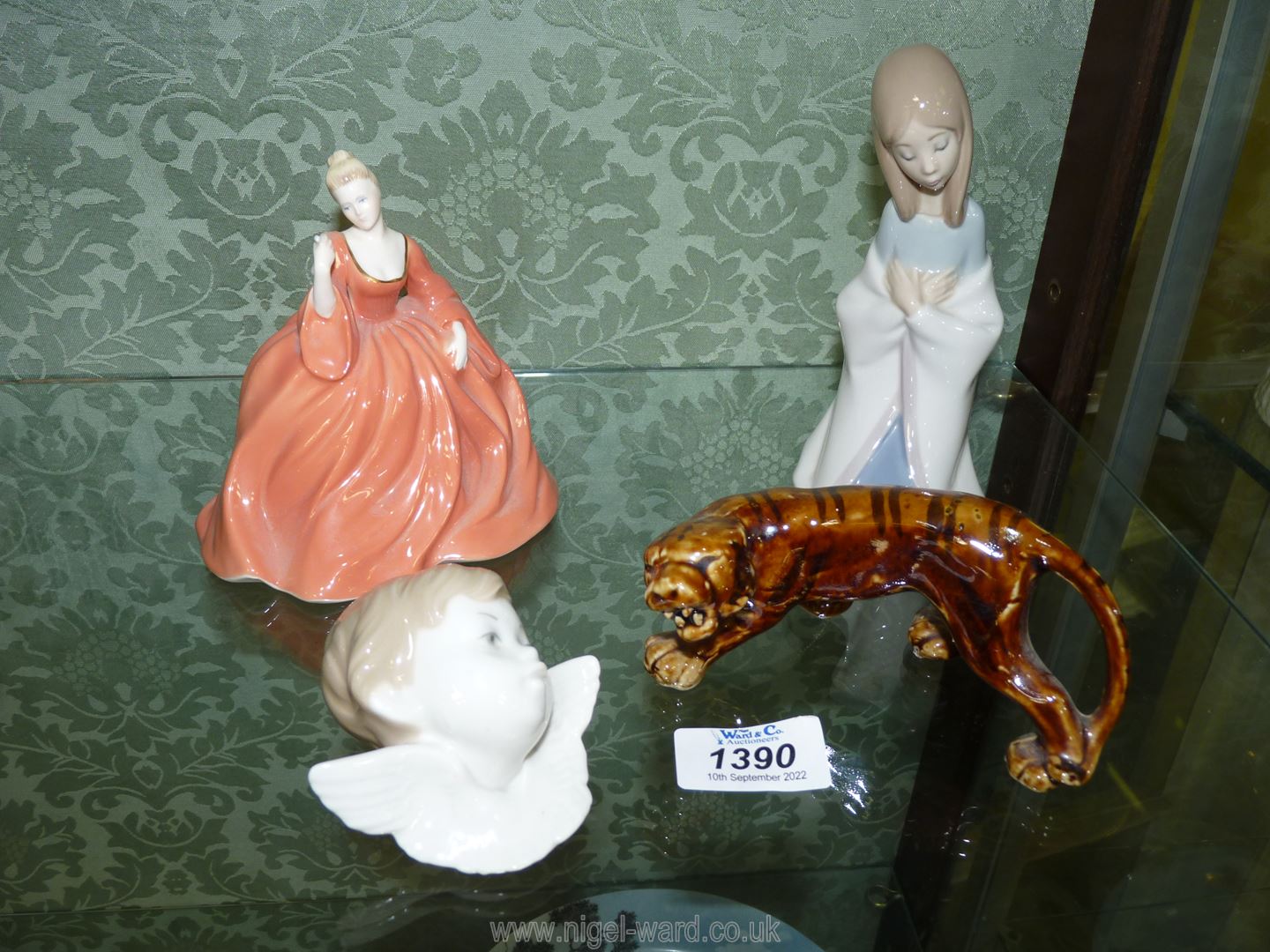 Two pieces of Lladro including kneeling girl and angel head, a Coalport figurine of 'Natalie,