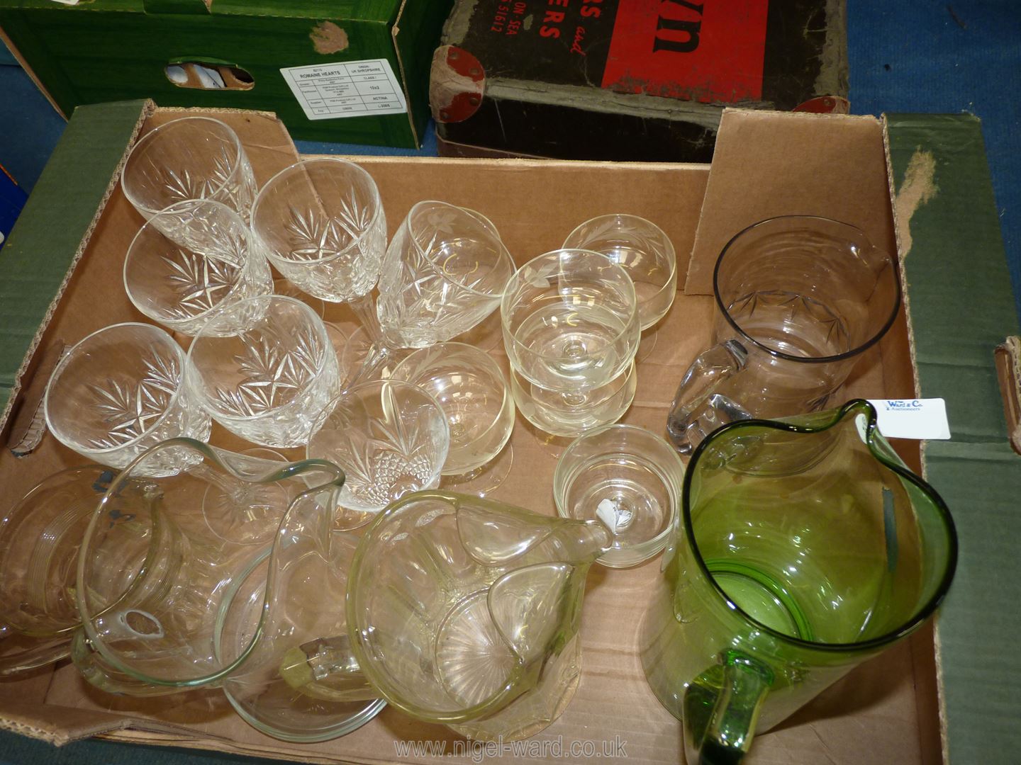 A quantity of glass including lemonade/water jugs, five etched glasses, six wine glasses, etc.