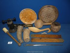A box of treen including a rustic old wooden spoon, horn vessels, ladles, a nut cracker, rulers,