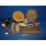 A box of treen including a rustic old wooden spoon, horn vessels, ladles, a nut cracker, rulers,