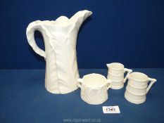 Four pieces of white Royal Worcester including palm leaf jug and sucrier and two small cream jugs