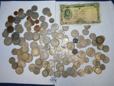 A quantity of old coins including florins, shillings, half crowns, sixpences etc,