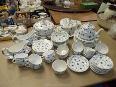 A quantity of blue and white dinnerware and tea sets to include Johnson Bros.