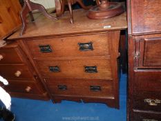 A Cottage Arts & Crafts style Oak Chest of three long Drawers,