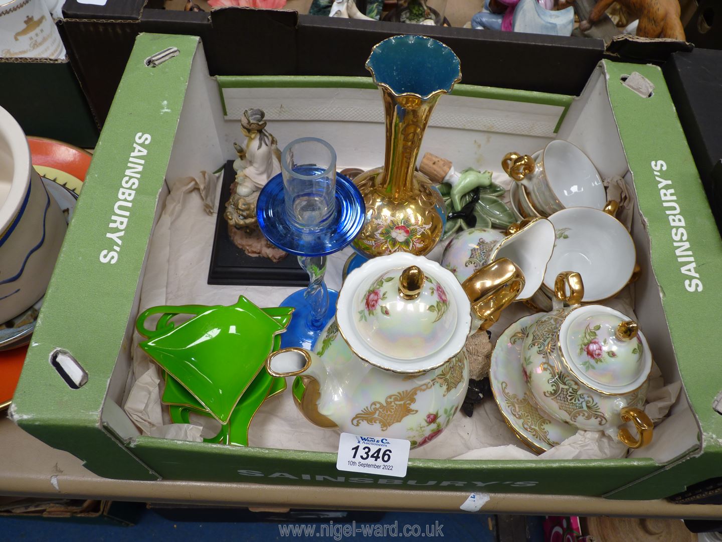 A quantity of china to include; Oriental tea set, green dishes, Oriental figures, glass vase,