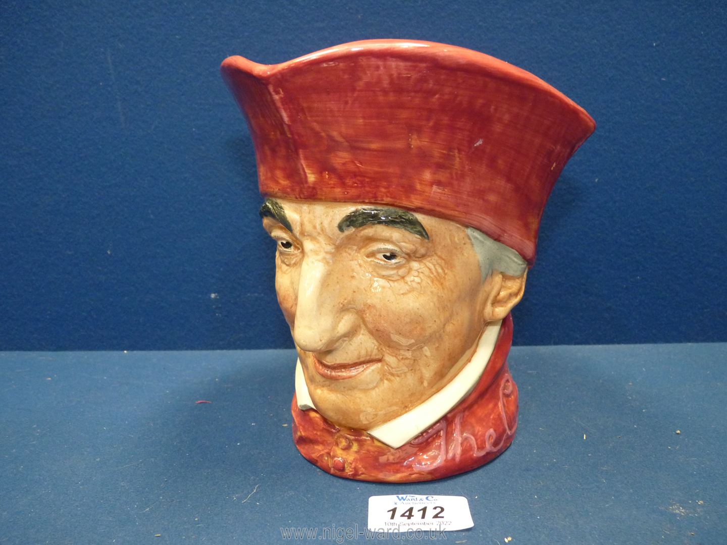 A Royal Doulton 'Cardinal' character jug.