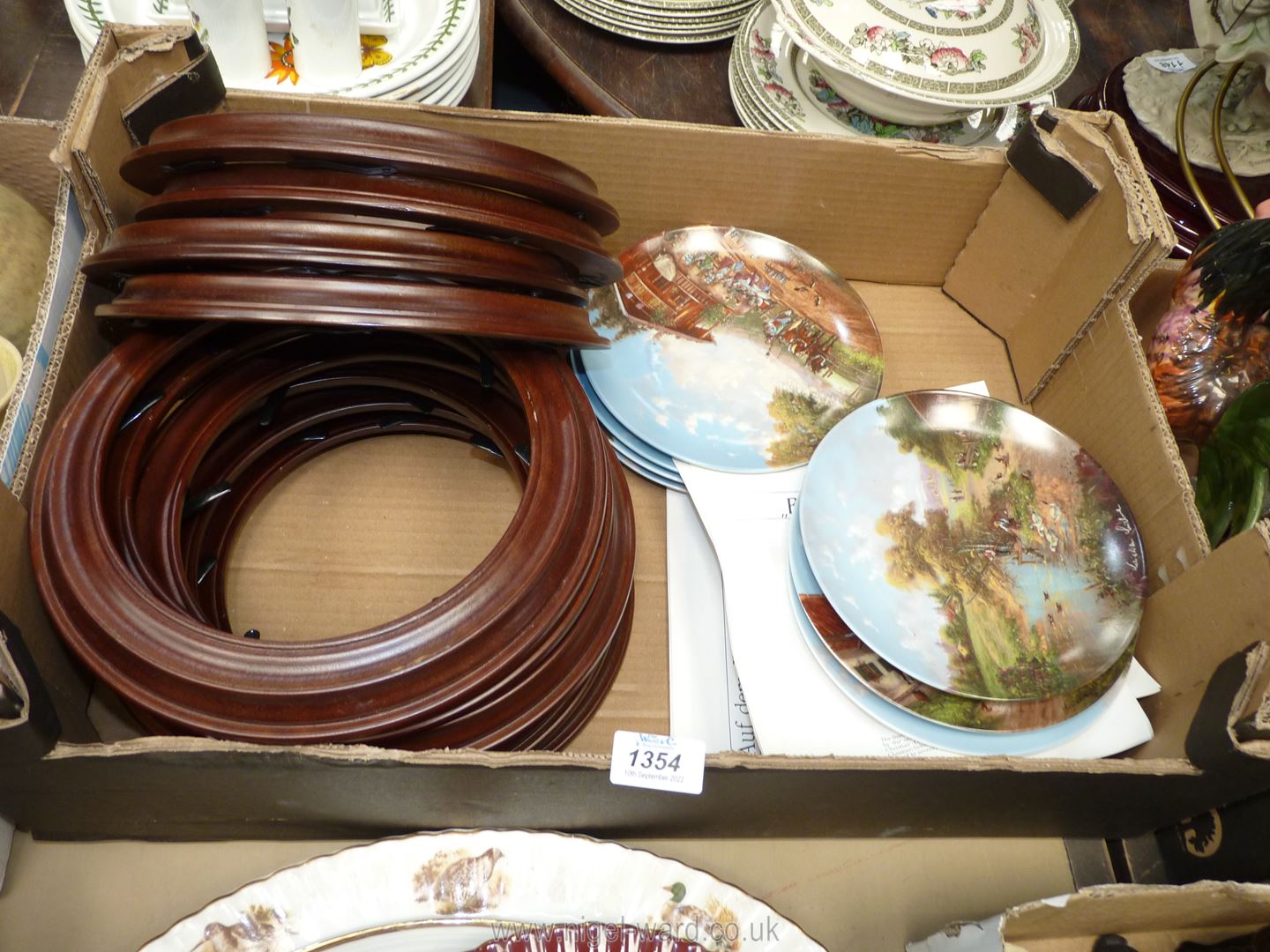 Ten Christian Luckel collectors' Plates and dark oak display frames with certificates of