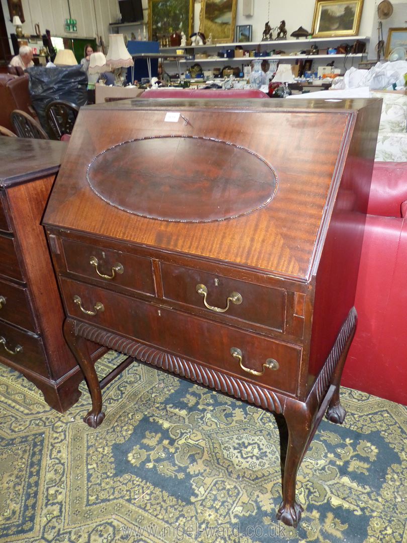 A 1930s dark Oak bureau,