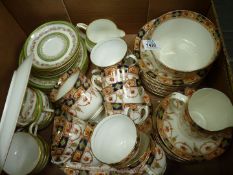 Two part teasets including Roslyn china having twelve cups, milk jug and sugar bowl, twelve saucers,