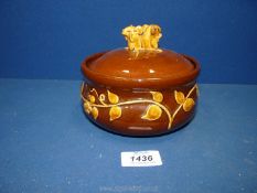 A David Cleverly Studio pottery lidded dish with foliage decoration to base and two mice to the lid,