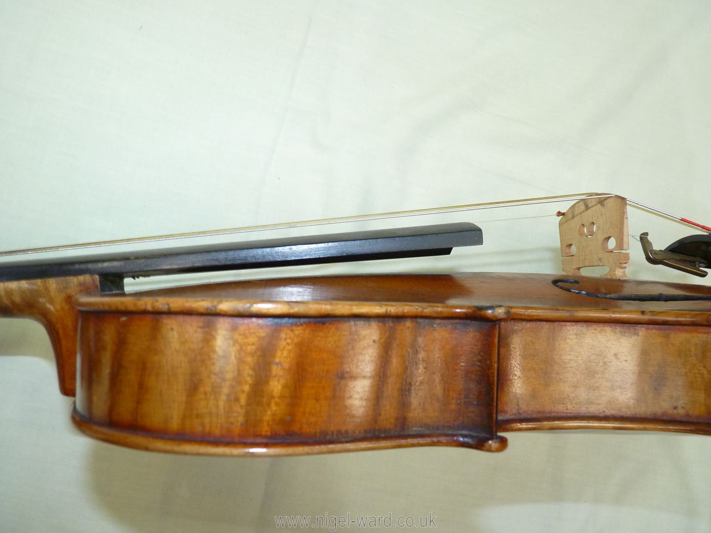 An antique violin having a well-carved scroll and nicely figured body including the back, - Image 20 of 49