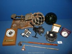 A quantity of miscellanea to include two glass fishing floats, Diawa J-12 fishing reel,