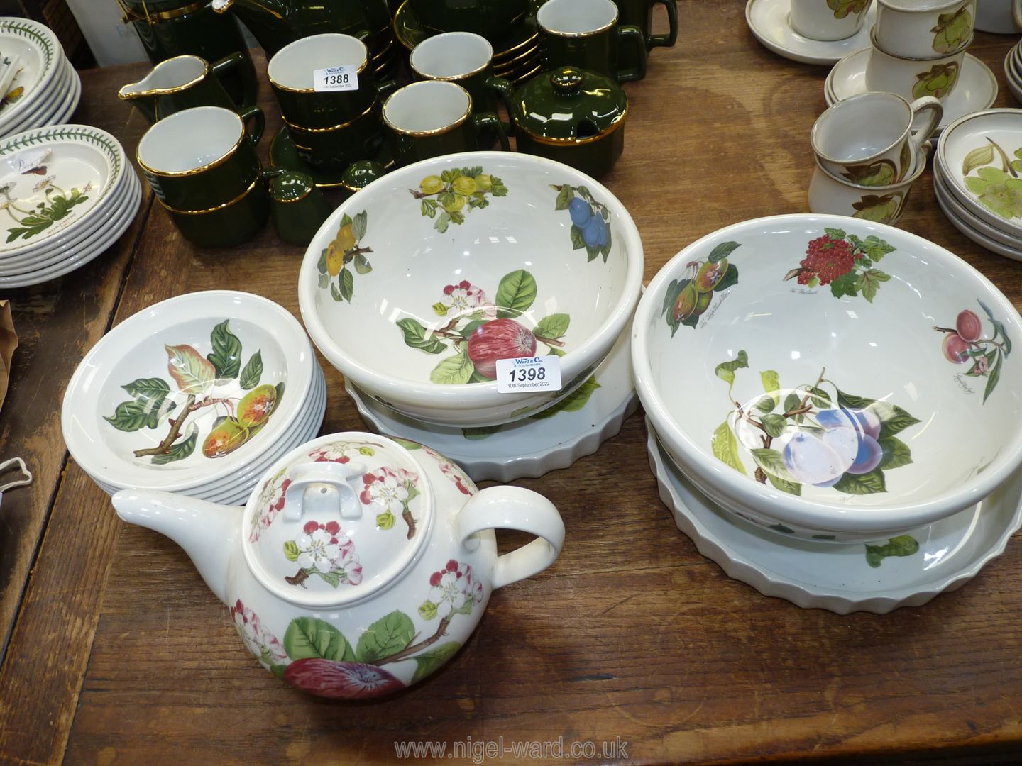 A quantity of Portmeirion Pomona pattern china including a teapot, two flan dishes,
