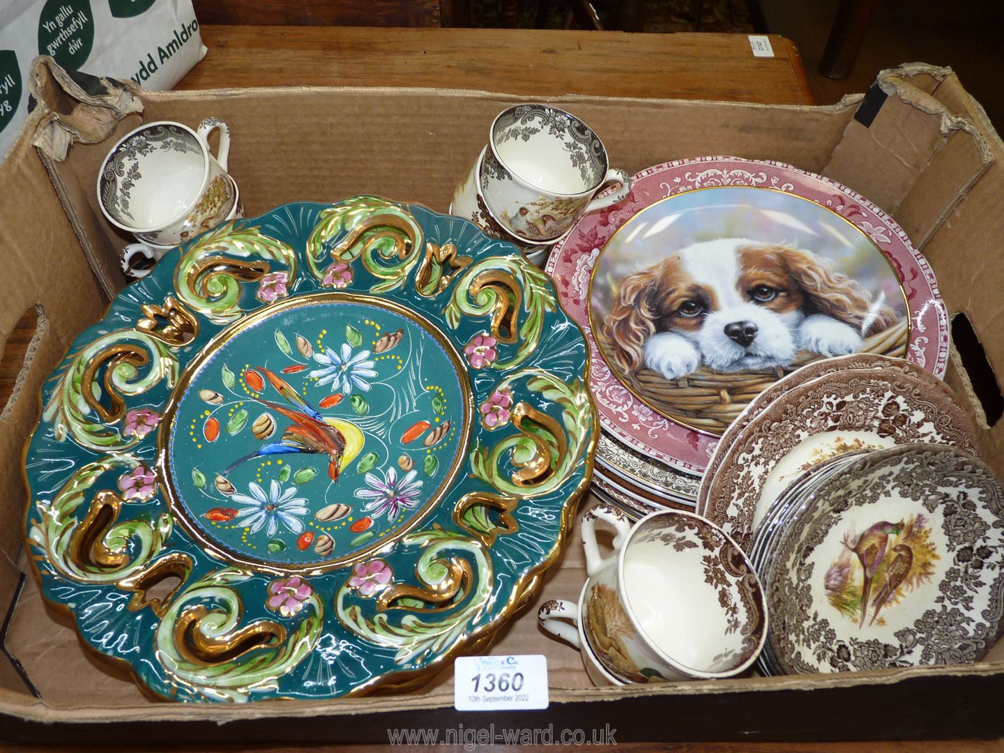A quantity of china including large colourful Belgian wall plates, Pallisey 'Game' series cups,
