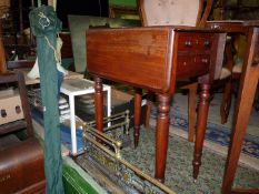 A Victorian Mahogany drop leaf Side Table having a pair of shallow drawers to one end and standing